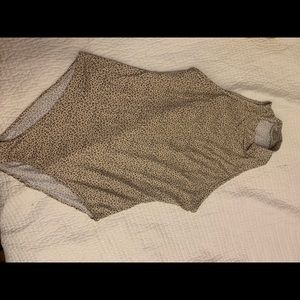 Sleeveless turtle neck body suit in L